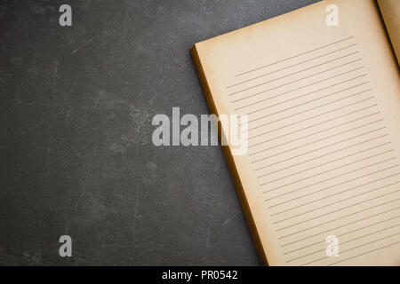 The old book on black background. Top view open old book. Stock Photo