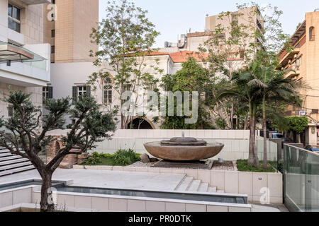 Large water fountain at street entrance restored Beirut mansion Stock Photo