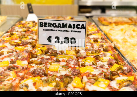 Pizza in a bakery of Old Town, Bergamo, Province of Bergamo, Lombardy, Italy, Europe Stock Photo