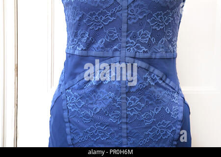 Blue Lace Sleeveless Evening Dress on Mannequin Stock Photo
