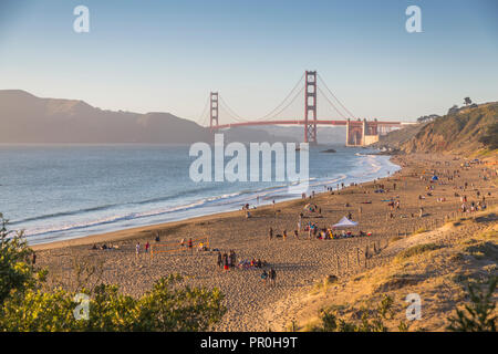 View of Golden Gate Bridge from Baker Beach at sunset, South Bay, San Francisco, California, United States of America, North America Stock Photo