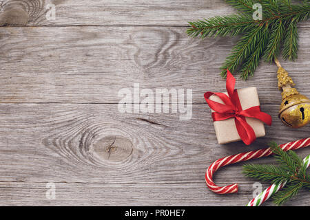Christmas background and decorations on right side of wooden table. Top view of holiday card with copy space Stock Photo