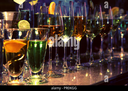 https://l450v.alamy.com/450v/pr0kgg/many-glasses-of-cocktail-put-in-a-row-on-the-counter-bar-pr0kgg.jpg