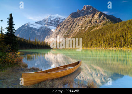 Canoe at Cavell Lake with Mount Edith Cavell in the Background, Jasper National Park, UNESCO World Heritage Site, Alberta, Rocky Mountains, Canada Stock Photo
