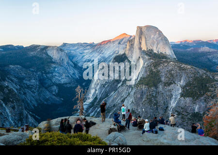 Half Dome and Yosemite Valley viewed from Glacier Point at dusk, Yosemite National Park, UNESCO, California, United States of America Stock Photo