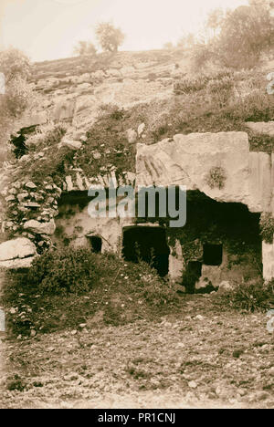 Valleys of Jehoshaphat and Hinnom A rock-hewn tomb at Akeldama. exterior & entrance. 1920, Jerusalem, Israel Stock Photo