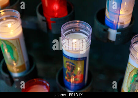 Portland, Oregon - Sep 24, 2018 : Rows of lit up candles at the memorial at The Grotto in Portland, Oregon, United States Stock Photo