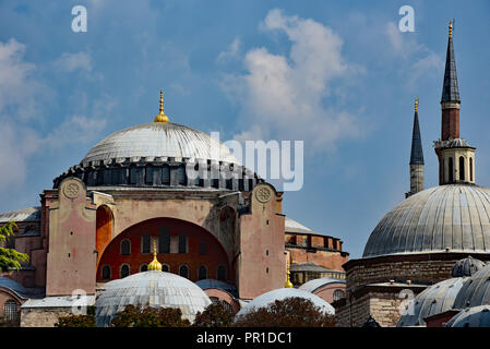 The main dome of Haghia Sophia, reaching to a height of 56 metres, and the smaller domes of the 'Baths of Roxelana', Istanbul, Turkey. Stock Photo