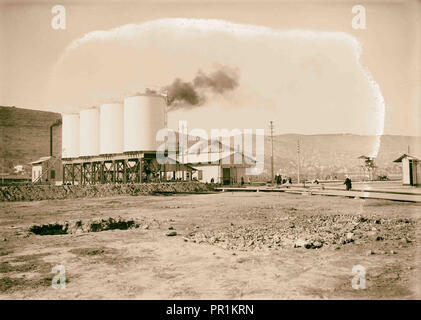 Shell oil tanks near Haifa. Other smaller tanks in Shell Co. yard. 1934, Israel, Haifa Stock Photo