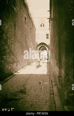 Aleppo. A narrow street in the old quarter; [Another view of a narrow street in the old quarter of Aleppo]. 1936, Syria, Aleppo Stock Photo