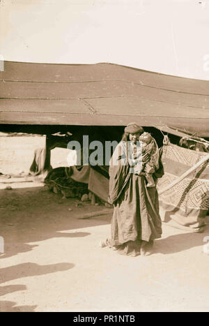 Bedouin wedding Bedouin mother and baby. 1900, Middle East, Israel and/or Palestine Stock Photo