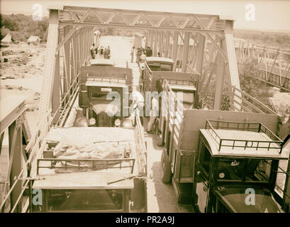 Allenby Bridge. Trucks on either side of the bridge. 1934, Jordan Stock Photo