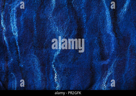 Beautiful abstract texture made of wool and silk, made in the style of "Gzhel" by hand Stock Photo