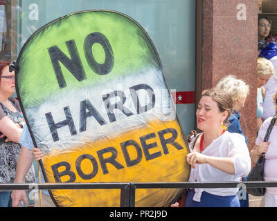 London, UK; 23rd June 2018; Pro-EU Protester on the Peoples Vote March Holds a Large Homemade Sign About the Brexit Irish Border Issue Stock Photo
