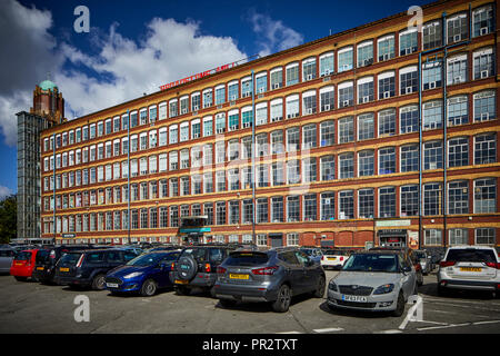 When completed, Broadstone Mill largest cotton spinning mill in the world, Built Stott and Sons, on eastern bank of drained Stockport Branch Canal in  Stock Photo