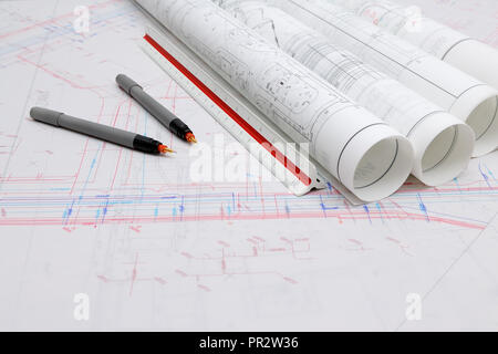 Architectural Drafts Rolled Up With Drafting Supplies Stock Photo -  Download Image Now - iStock