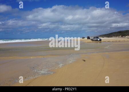 4x4s approaching Eli Creek on 75 Mile Beach, Fraser Island, Australia Stock Photo