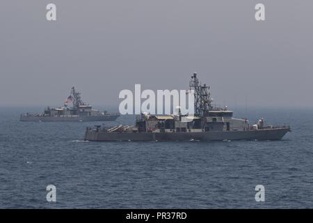 The coastal patrol ships USS Thunderbolt (PC 12) and USS Squall (PC 7 ...