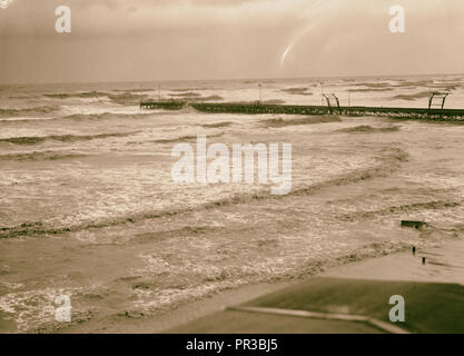 Official opening of Tel Aviv. The Tel Aviv jetty in storm. Distant view ...