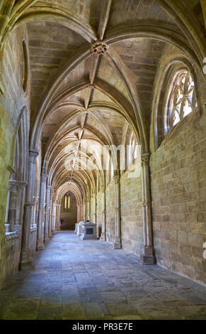 EVORA, PORTUGAL - JULY 01, 2016:  The interior of medieval cloister of Evora Cathedral (Se) with the massive arcade made of granite. Portugal Stock Photo