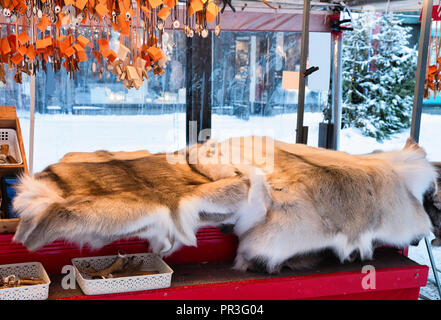 Winter Saami Souvenirs such as reindeer fur and horns at Finnish Christmas Market, Rovaniemi, Finland, Lapland. At the North Arctic Pole. Stock Photo