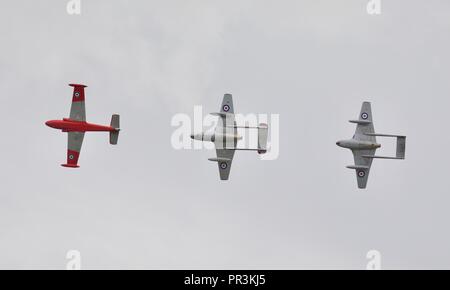 BAC Jet Provost T5, de Havilland Vampire FB.52 and T.55 flying in formation at the IWM Duxford Battle of Britain airshow on the 23rd September 2018 Stock Photo