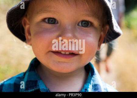 Happy little boy smiling for the camera.  MODEL RELEASED Stock Photo
