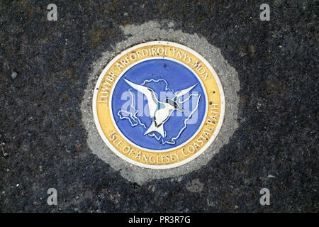 Isle of Anglesey Coastal Path Floor Sign Marker in Bull Bay, Wales, UK. Stock Photo