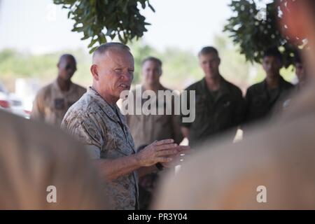 ROYAL AUSTRALIAN AIR FORCE BASE, Australia— U.S. Marine Lt. Gen. Lawrence Nicholson, commanding general of III Marine Expeditionary Force, addresses Marines with Marine Unmanned Aerial Vehicle Squadron 3, Marine Aircraft Group 24, 1st Marine Air Wing, Marine Rotational Force Darwin, on July, 28, 2017. Nicholson traveled to Australia to observe how to further improve the proficiency and quality of life to the Marines deployed in support of MRF-D. Stock Photo