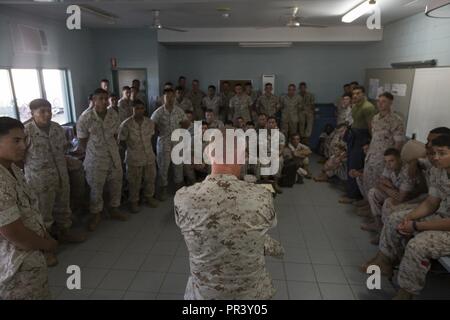 AUSTRALIAN ARMY BASE ROBORTSON BARRACKS, Australia— U.S. Marine Lt. Gen. Lawrence Nicholson, commanding general of III Marine Expeditionary Force, speaks to Bravo Company, 1st Transportation Support Battalion, 1st Marine Logistics Group, Marine Rotational Force Darwin (MRF-D), on July 26, 2017. Nicholson traveled to Australia to observe how to further improve the proficiency and quality of life to the Marines deployed in support of MRF-D. Stock Photo