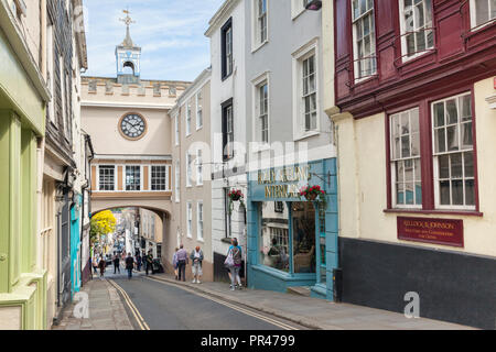 25 May 2018: Totnes, Devon, UK - Shoppers and tourists in the High Street. Stock Photo