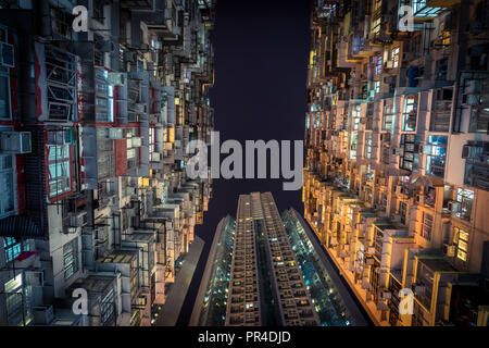 Looking up at apartment buildings in Hong Kong Stock Photo