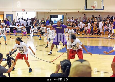 Former NBA champion Metta World Peace (Ron Artest) gave a lesson in defense to defenders at March Air Reserve Base, California, appearing at a Los Angeles Lakers military appreciation event September 9, 2018. March ARB is the home of the 452d Air Mobility Wing of the Air Force Reserve Command and the 163d Attack Wing of the California Air National Guard, among other military units. Stock Photo