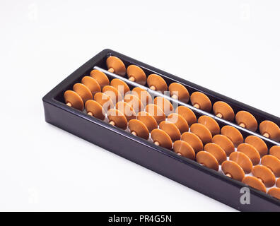 An old chinese abacus on white background Stock Photo