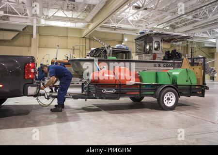 Coast Guard Aids to Navigation Team Georgetown crew members prepare assets Sept. 13, 2018, at the Hurricane Florence Incident Command Post in Charleston, S.C. Coast Guard crews from across the U.S. are strategically relocating personnel and assets for Hurricane Florence post-storm response. Stock Photo