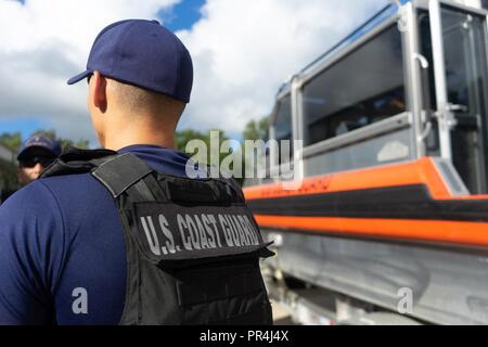 Coast Guard Maritime Safety and Security Team Miami and Tactical Law Enforcement Team South crew members prepare shallow water response boats to assist post Hurricane Florence Sept. 13, 2018, in Augusta, Georgia. Coast Guard crews from across the U.S. are strategically relocating personnel and assets for Hurricane Florence post-storm response. Stock Photo