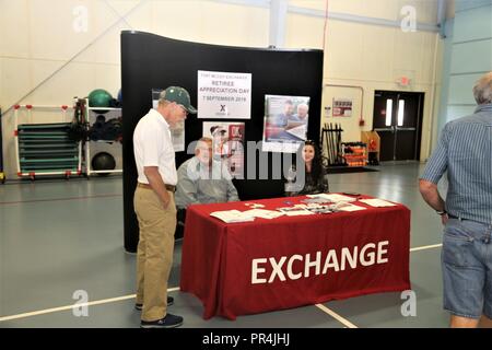 Attendees Check Out A Benefits Fair For The 2018 Retiree