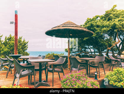 Cafe in Capo Testa at Santa Teresa Gallura at the Mediterranean Sea on Sardinia Island in Summer Italy. Stock Photo