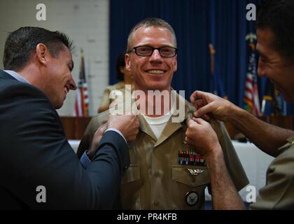 PEARL HARBOR (Sept. 14, 2018) Chief Aerographer's Mate Timothy Golden is pinned during a chief petty officer pinning ceremony at the Hickam Chapel on Joint Base Pearl Harbor-Hickam, Sept. 14. The ceremony recognized 20 newly-pinned chiefs assigned to the Hawaii region. Stock Photo