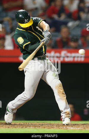 Anaheim, California, USA. September 28, 2018: Oakland Athletics shortstop Marcus Semien (10) gets a RBI double in the eighth inning during the game between the Oakland A's and the Los Angeles Angels of Anaheim at Angel Stadium in Anaheim, CA, (Photo by Peter Joneleit, Cal Sport Media) Credit: Cal Sport Media/Alamy Live News Stock Photo