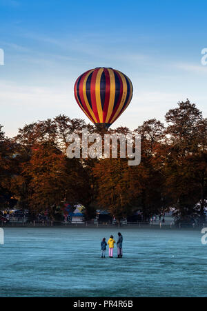 York, UK. 29th September, 2018. A mass balloon launch took place at sunrise from York Knavesmire as part of the second annual York Balloon Fiesta. Fifty balloons took to the skies watched by hundreds of onlookers. The launch is part of a three day event which runs until Sunday the 30th of September. Photo Bailey-Cooper Photography/Alamy Live News Stock Photo