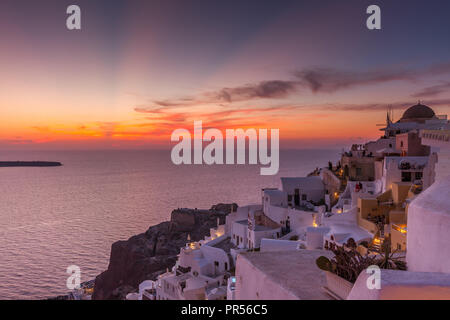 Classic sunset in Oia in Santorini in Greece Stock Photo