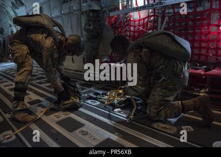 Static Line Jumpmaster Command Screening Checklist A U.S. Army jumpmaster with 1st Special Forces Group (Airborne), left ...