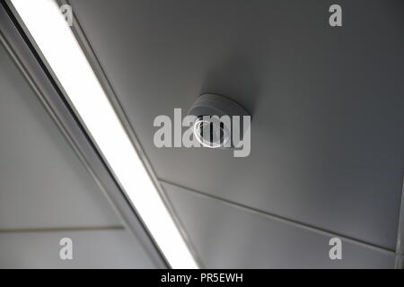 Security camera or cctv camera on ceiling Stock Photo