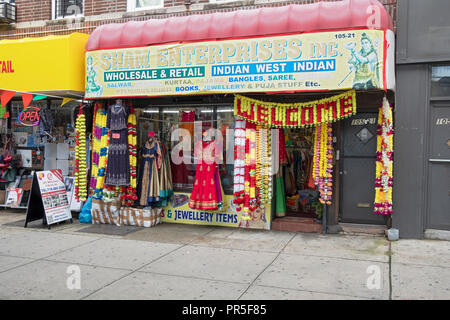 The exterior of SHAM ENTERPRISES INC., a store that sells Indian fashions  on Liberty Ave. in South Richmond Hill, Queens, New York City. Stock Photo