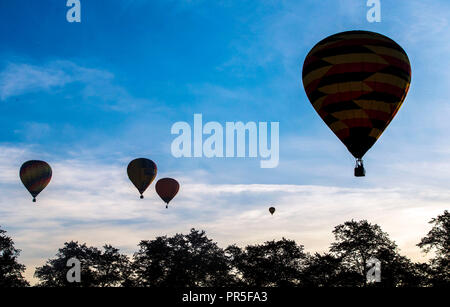 Hot Air Balloons take part in the York Balloon Fiesta in Yorkshire. Stock Photo