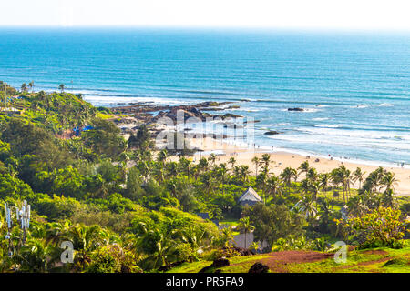 Green views of Vagator beach from the top of Chapora Fort, Goa, India, Asia. Vagator Beach is one of the most beautiful beaches in north Goa. Stock Photo