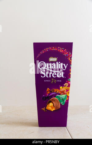 Illustrative editorial of a carton of Nestle Quality Street sweets, with copyspace – Bournemouth, United Kingdom – June 15th, 2018 Stock Photo