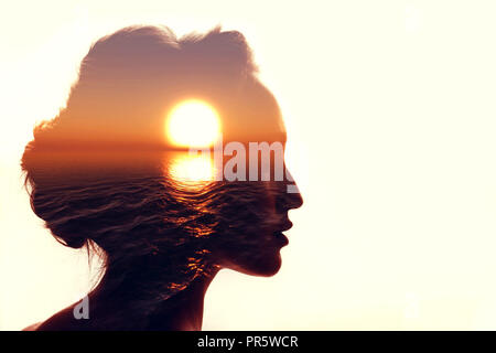 Psychology concept. Sunrise and woman silhouette. Stock Photo