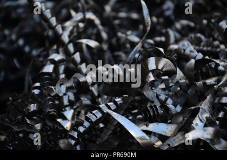 Twisted spiral steel or metall shavings. Milling or lather Stock Photo